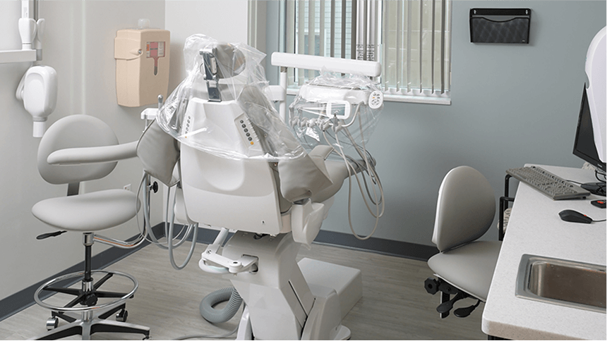 Picture of a dentist office room with chair