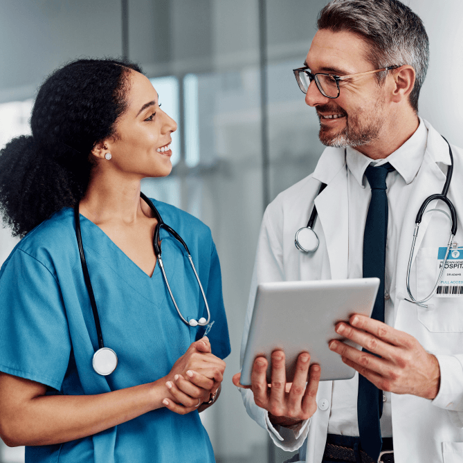 Doctors speaking and reviewing information