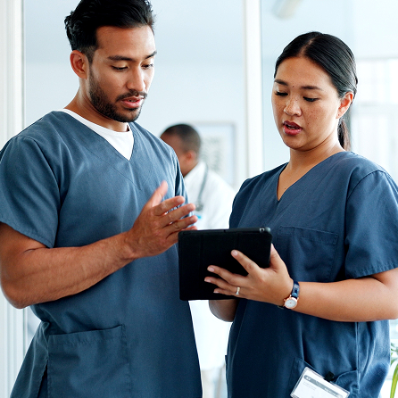 Doctors speaking and reviewing information