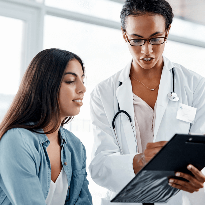 Doctors speaking and reviewing information