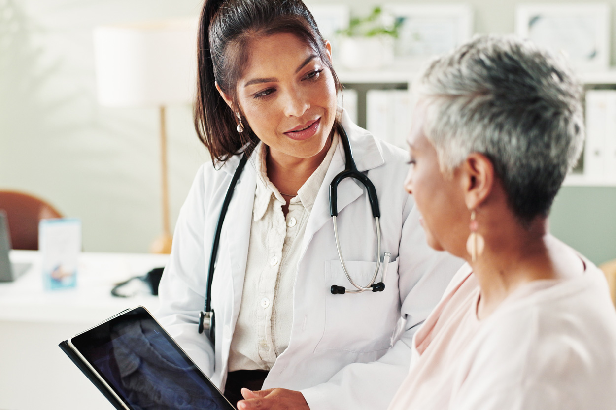 Doctor talking with a patient